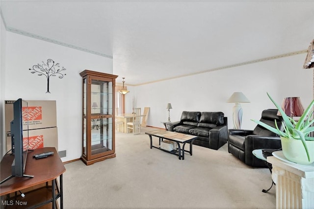 carpeted living room with crown molding