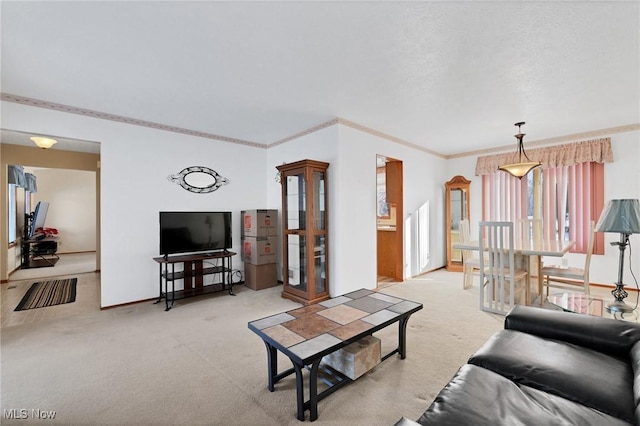 carpeted living room with crown molding