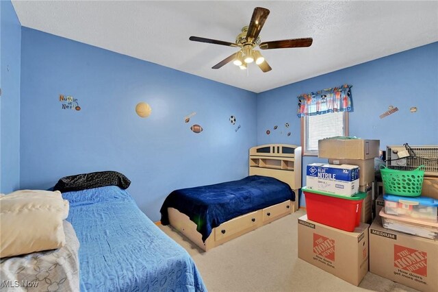 bedroom featuring carpet flooring and ceiling fan