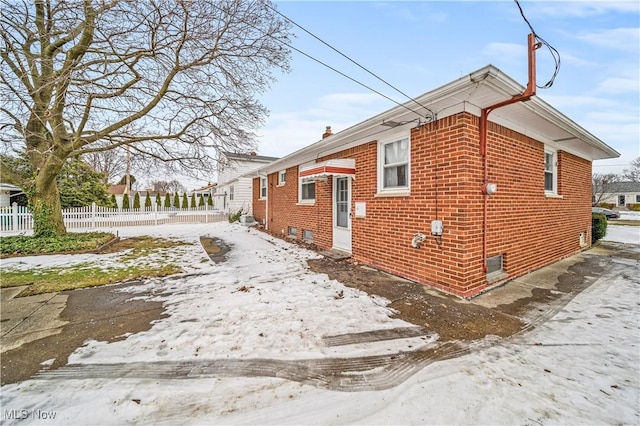 view of snow covered property