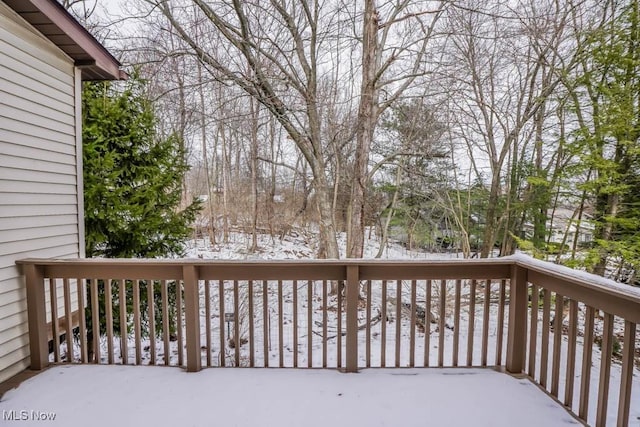 view of snow covered deck