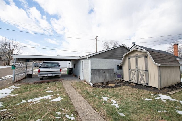 view of outbuilding featuring a carport