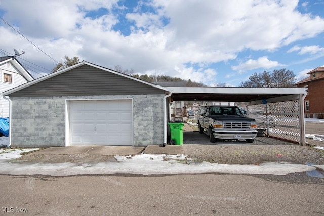 garage with a carport