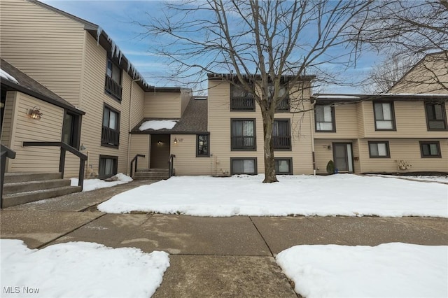 view of snow covered property