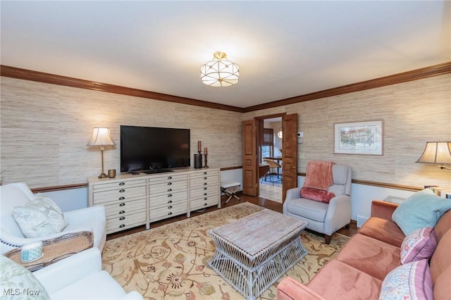 living room featuring crown molding and light hardwood / wood-style floors