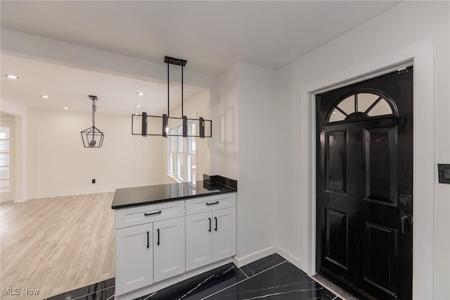 entryway featuring dark hardwood / wood-style floors