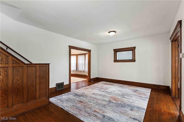 interior space with dark hardwood / wood-style flooring