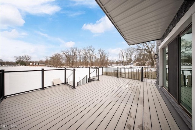 view of snow covered deck