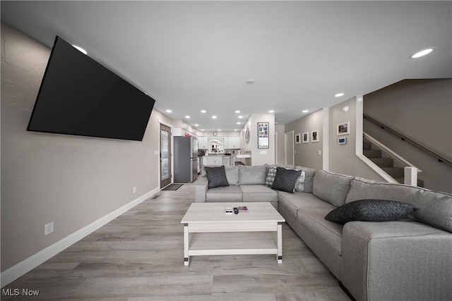 living room featuring light wood-type flooring