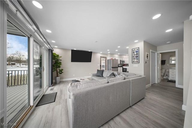 living room featuring light hardwood / wood-style floors