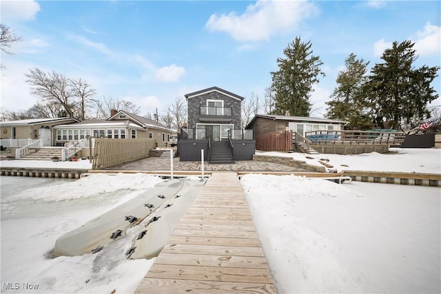 view of snow covered deck