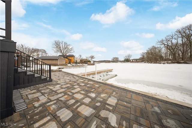 view of snow covered patio