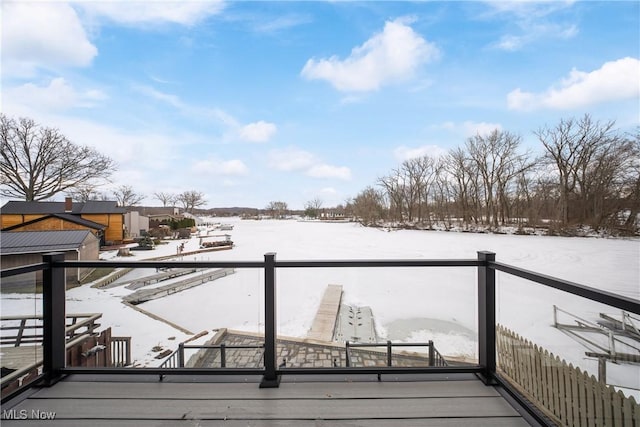 view of snow covered deck