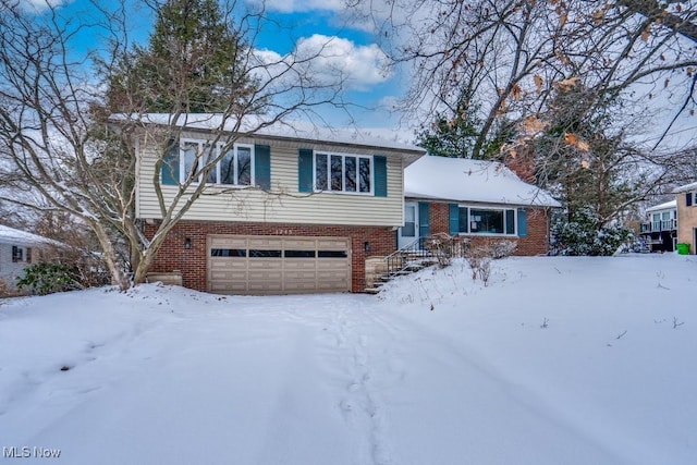 split level home with a garage