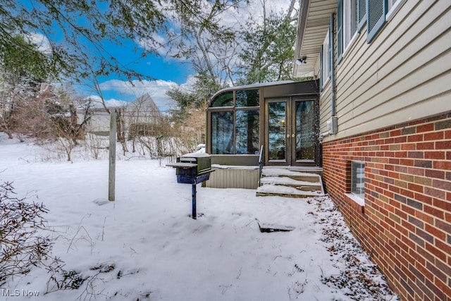 view of yard covered in snow