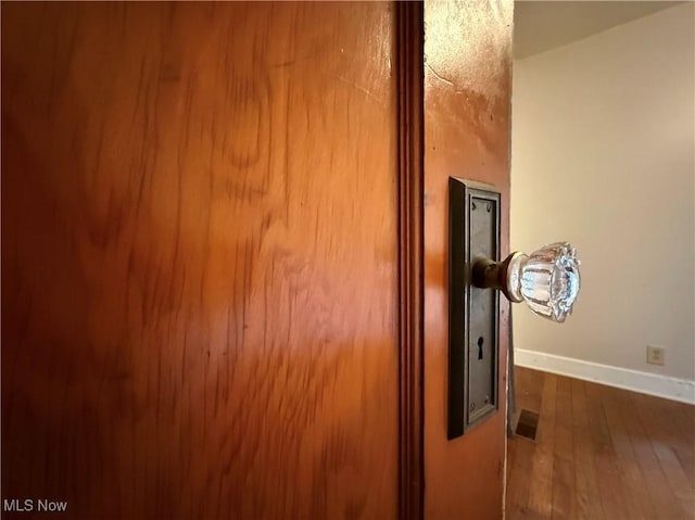 interior details featuring wood-type flooring