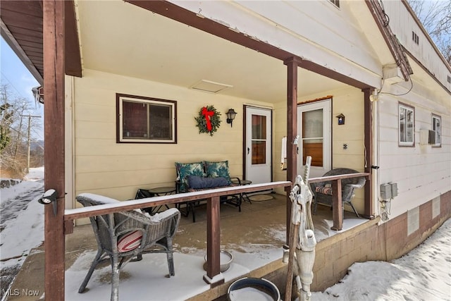 view of snow covered patio