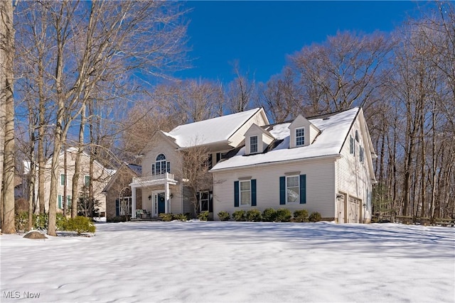 view of front of house with a pergola and a garage