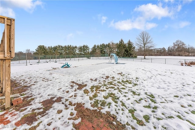 view of yard covered in snow