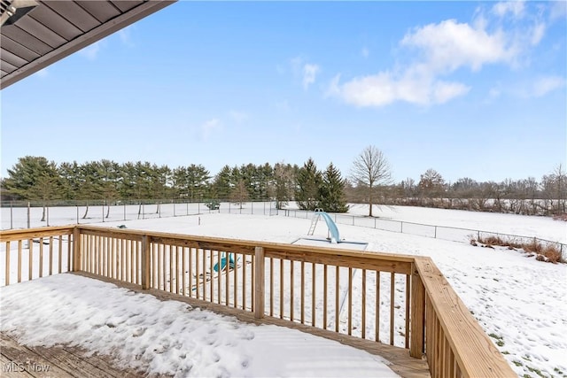 view of snow covered deck