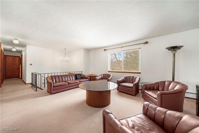 living room featuring a baseboard heating unit, a chandelier, light carpet, and a textured ceiling