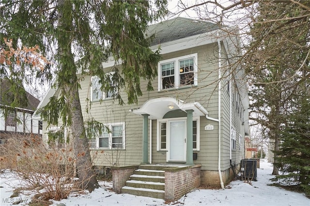 view of front of home featuring central air condition unit