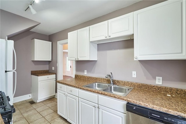 kitchen featuring sink, stainless steel dishwasher, white fridge, black gas range, and white cabinets