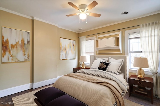 bedroom with hardwood / wood-style flooring, ceiling fan, and ornamental molding