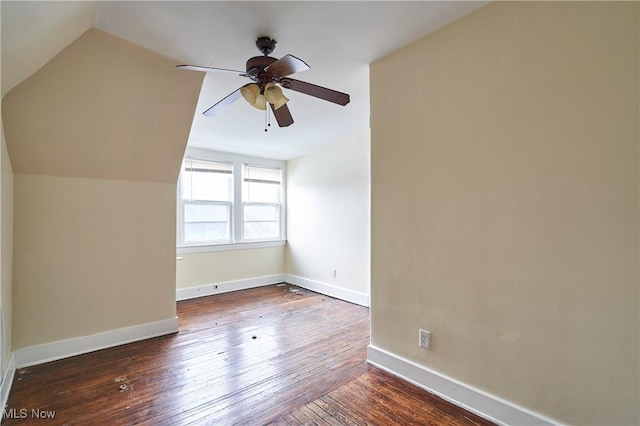 bonus room with ceiling fan, lofted ceiling, and dark hardwood / wood-style floors