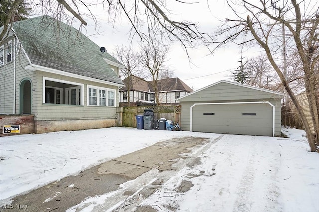 view of front of home with an outbuilding and a garage