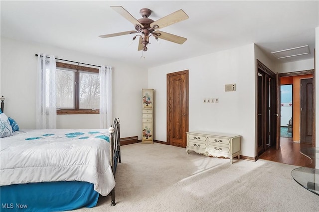 carpeted bedroom featuring ceiling fan