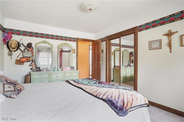 carpeted bedroom with access to outside