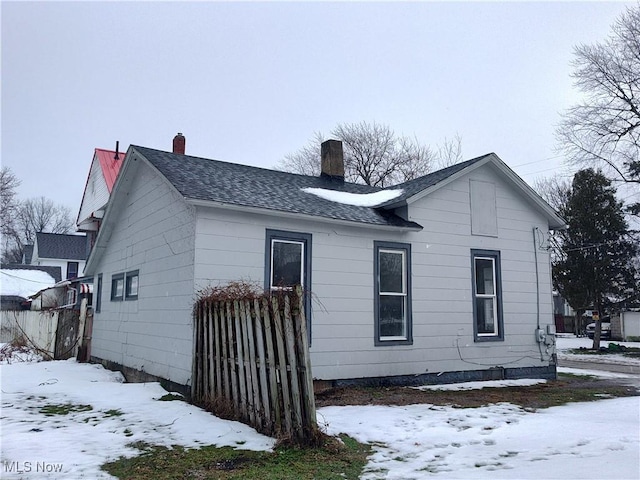 view of snow covered property