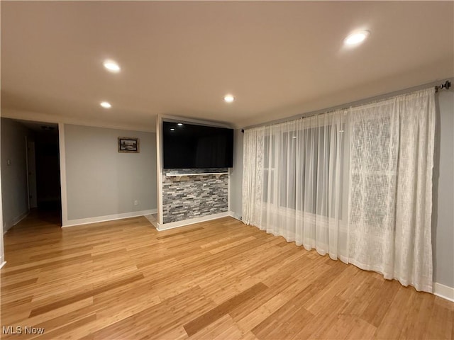 unfurnished room with light hardwood / wood-style flooring