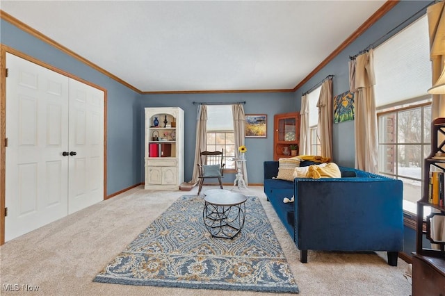 carpeted living room featuring crown molding