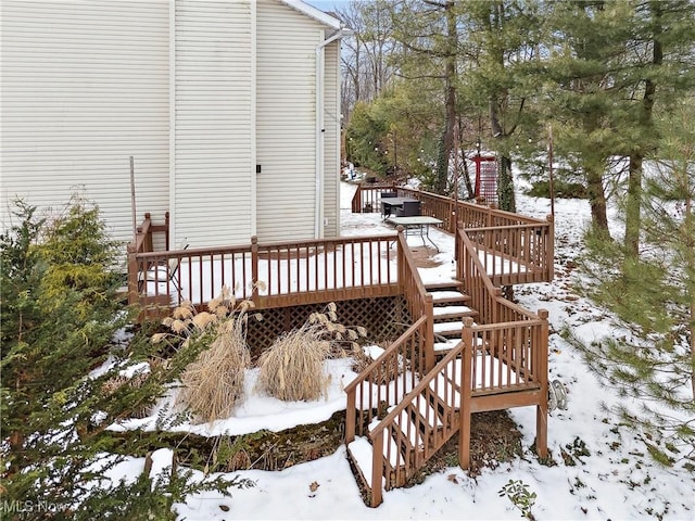 view of snow covered deck