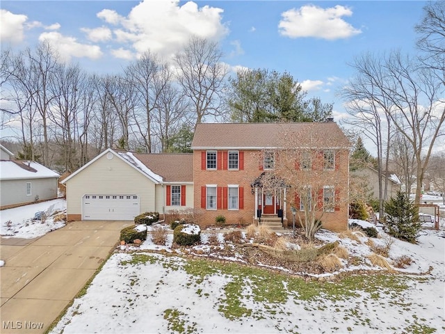 colonial-style house with a garage