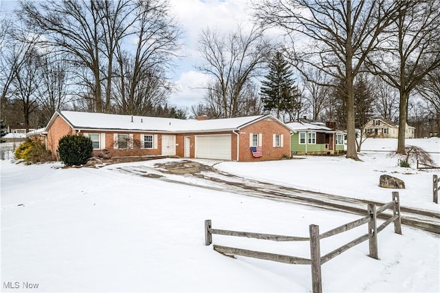 single story home with a garage