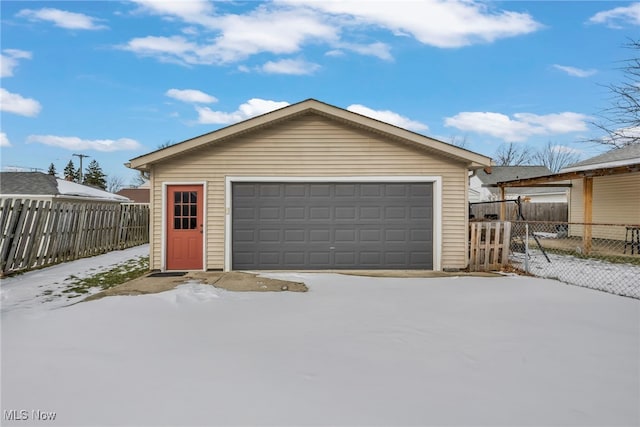 view of snow covered garage