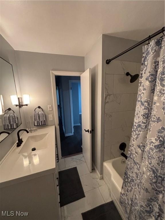 bathroom with shower / bath combination with curtain and vanity