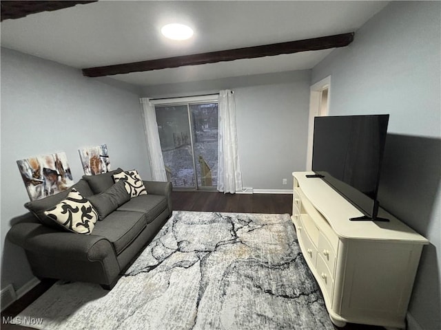 living room featuring dark hardwood / wood-style floors and beam ceiling