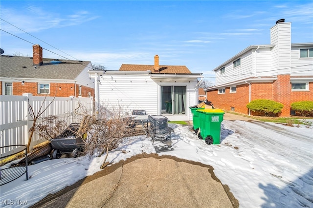 view of snow covered house