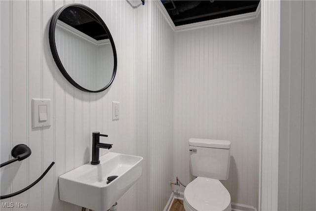 bathroom with sink and toilet