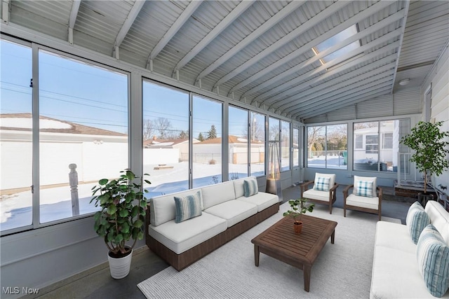 sunroom with lofted ceiling