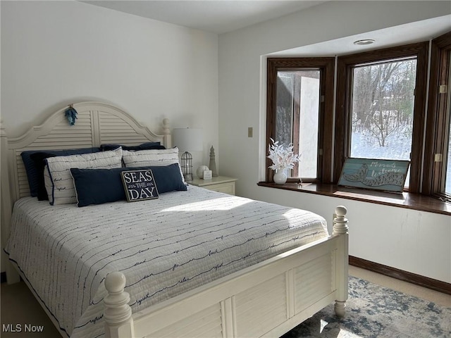 bedroom with baseboards