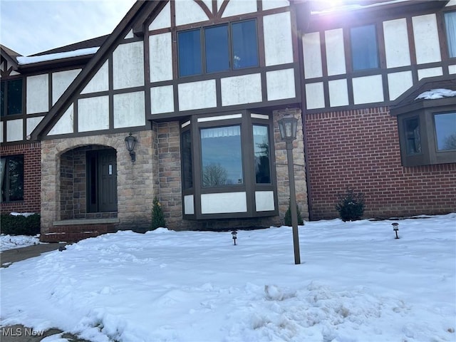 view of snow covered property