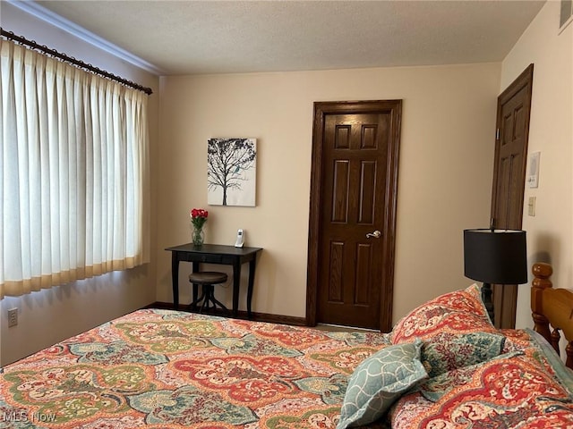 bedroom featuring a textured ceiling