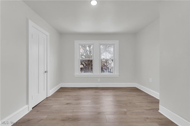 3295 Yorkshire Rd, Cleveland Heights, OH 44118 - unfurnished bedroom featuring baseboards and wood finished floors