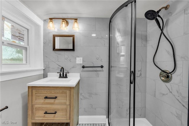 bathroom featuring vanity and walk in shower
