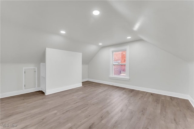3295 Yorkshire Rd, Cleveland Heights, OH 44118 - additional living space featuring lofted ceiling, baseboards, wood finished floors, and recessed lighting